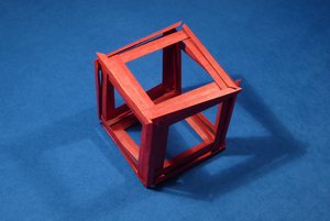 Cube compressed in all three directions
