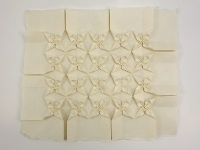 Wedge Flower Tessellation, folded from Awagami Kozo Natural Select paper