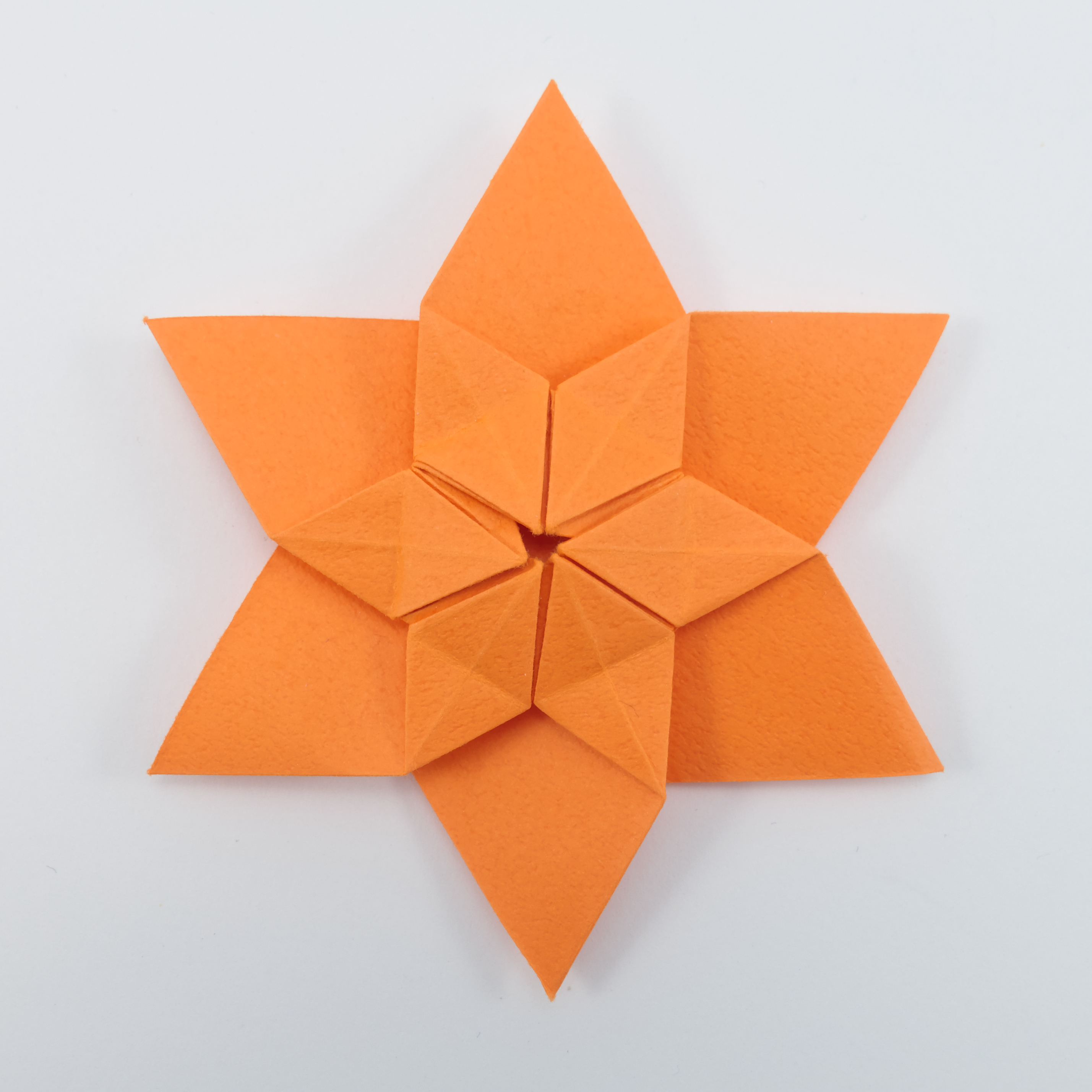 The multi-material 3D printed hexagon-twist origami structure. (A