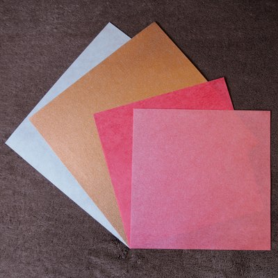 Example sheets of Nicolas Terry Tissue Foil in various colors. The two red squares are front and back side of same sheet color.