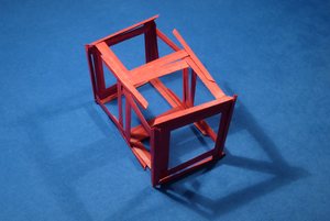 Cube compressed along two axes