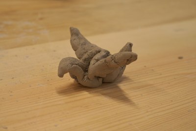 Traditional crane folded from unfired clay