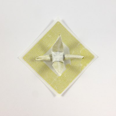 Traditional crane folded from RFID chip, top-down view