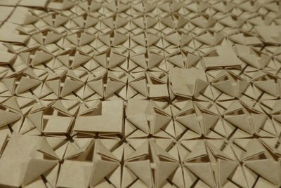 Four-Sink-Base Tessellation with corners folded up to create an image