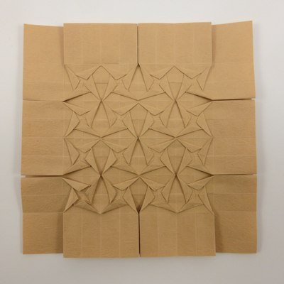 Spread Sunk Square Twist Tessellation folded from Kinumomi (Rhino Hide) paper