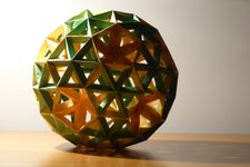 Truncated Icosahedron with Tessellated Hexagonal Faces and Inverted Pyramids on Pentagonal Faces