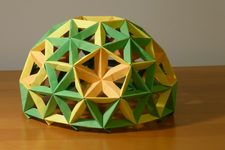 Truncated Icosahedron with Tessellated Hexagonal Faces and Inverted Pyramids on Pentagonal Faces